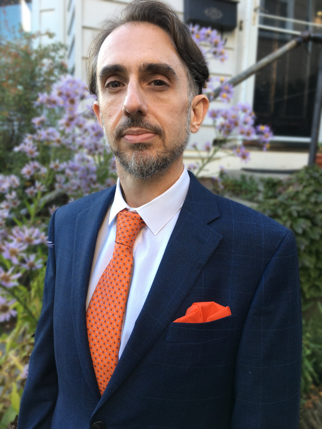 Photograph of Steve Hoey wearing a suit and tie